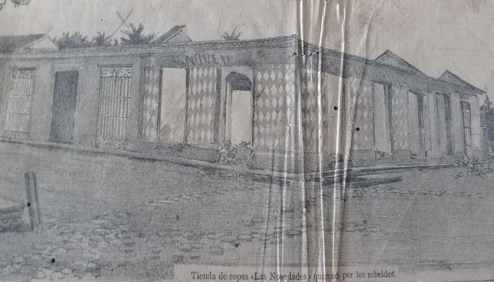 Tienda de ropas Las Novedades, quemada por los rebeldes. Foto: Tomada del periódico La Caricatura, de 1896.